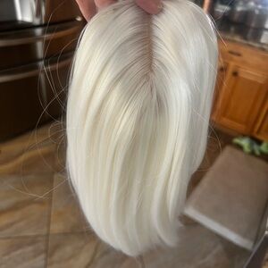 3 Toppers Source Unknown Yellow Wig with Smooth Texture and Significant Volume